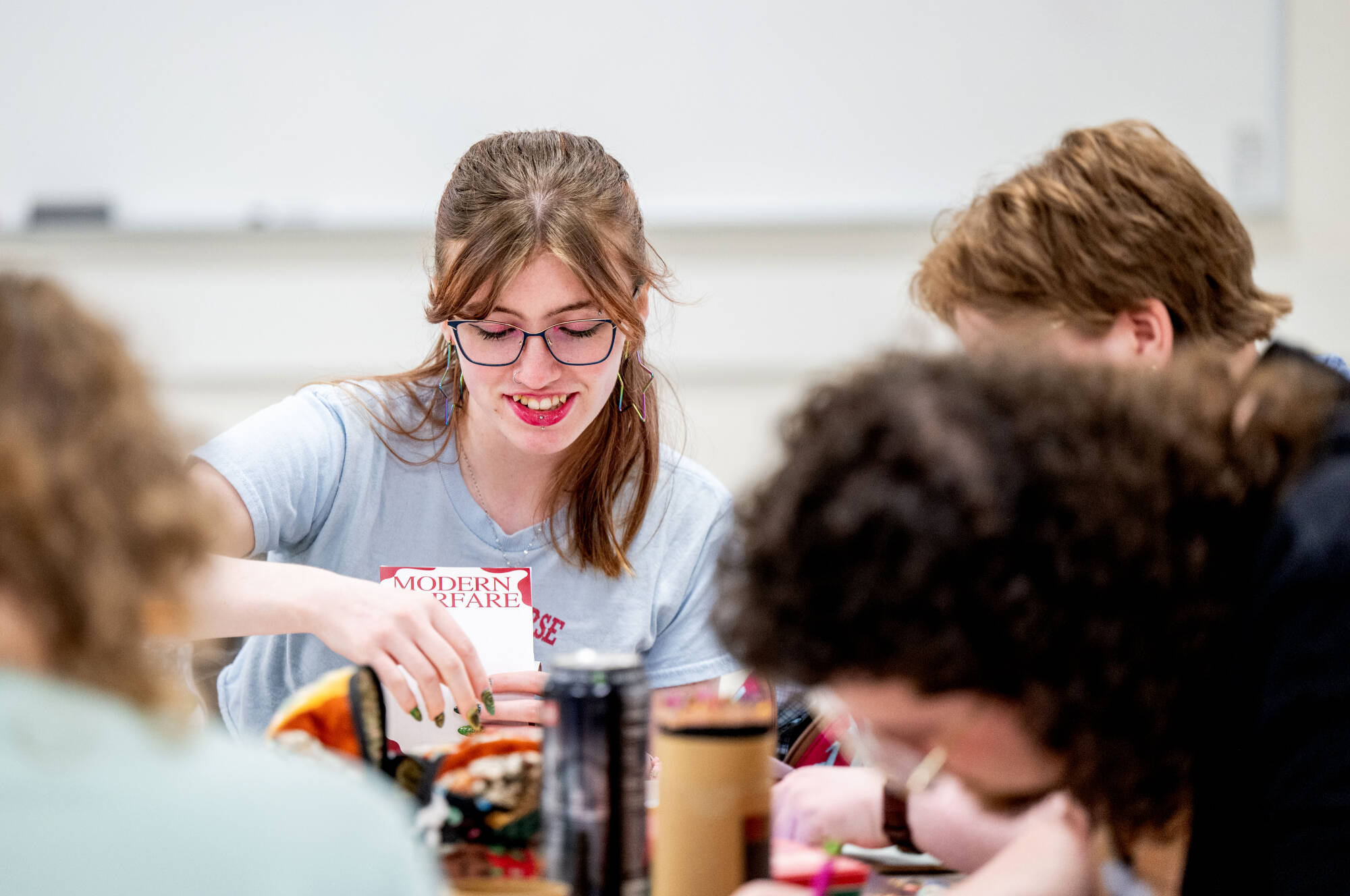 Kailey Washburn, a senior classics and anthropology major, works on a zine project during Melissa Morison’s Classics 395/495 class March 26.
